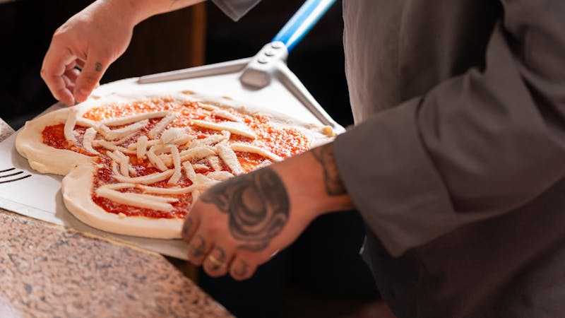 Jet's pizza kitchen - authentic Detroit pizza preparation